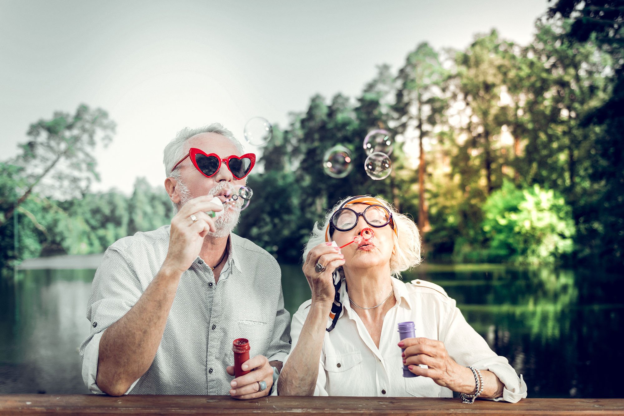 Circa-46_elderly_couple_blowing_bubbles